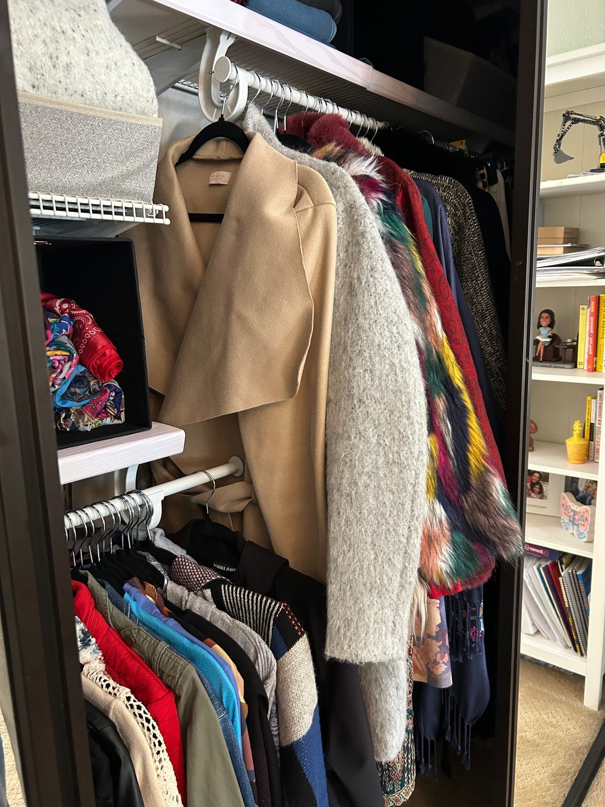 Closet after — coats and sweaters hung with room to breathe