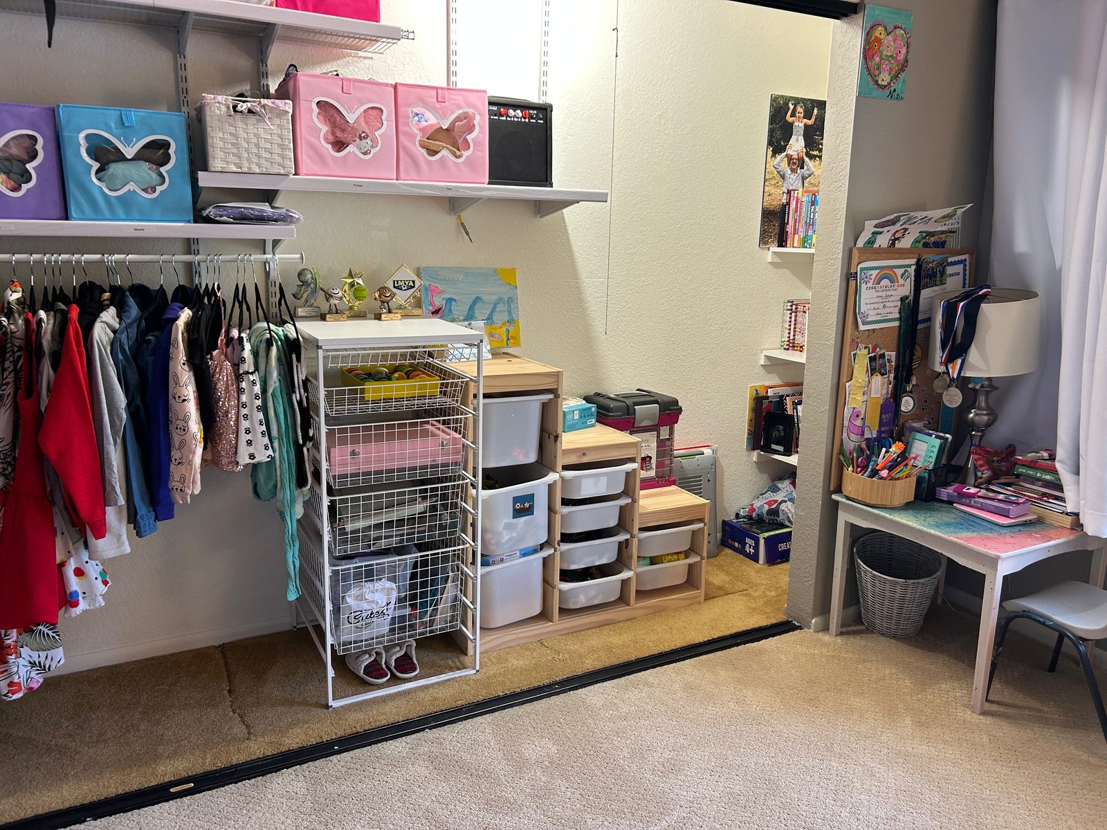 Closet play nook after — storage drawers sorted and a tidy craft desk
